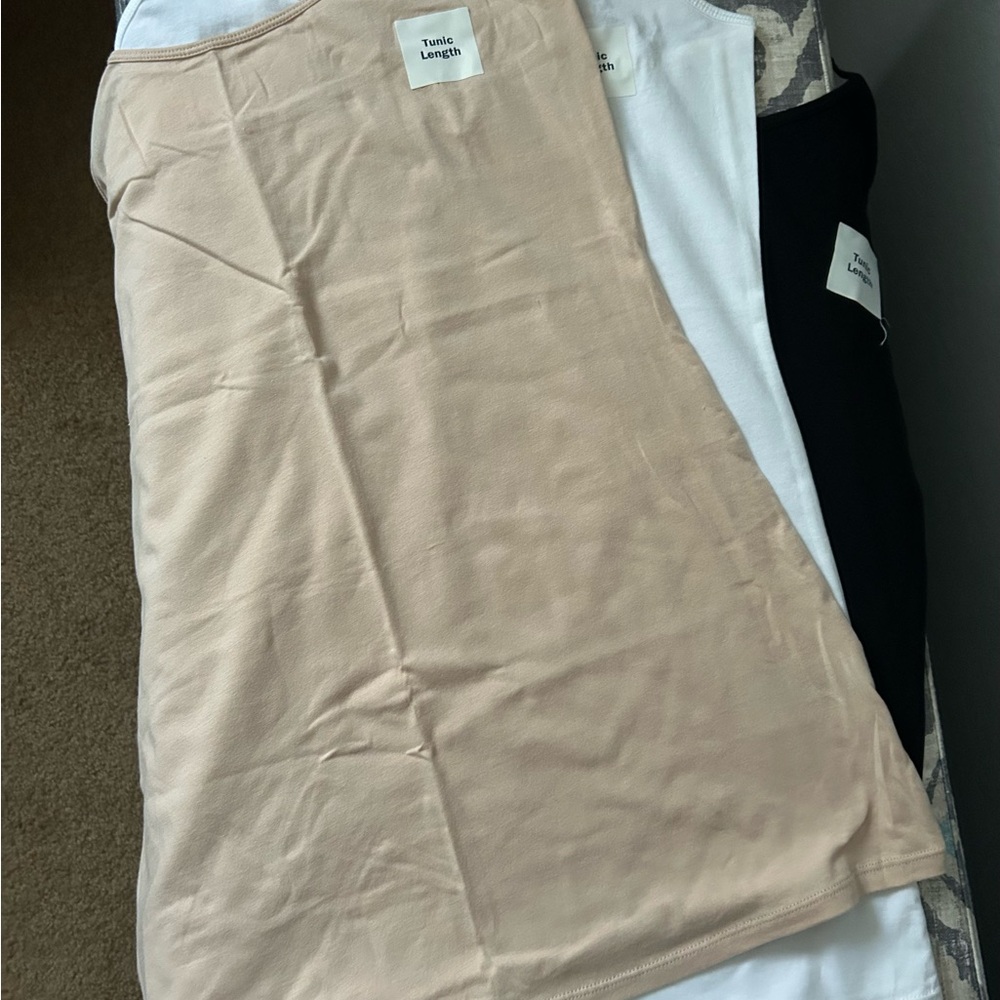 Tonie Length Beige, White, and Black Tops